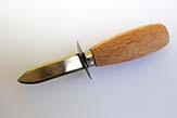 Oyster knife has a strong blade and a finger protection ring.